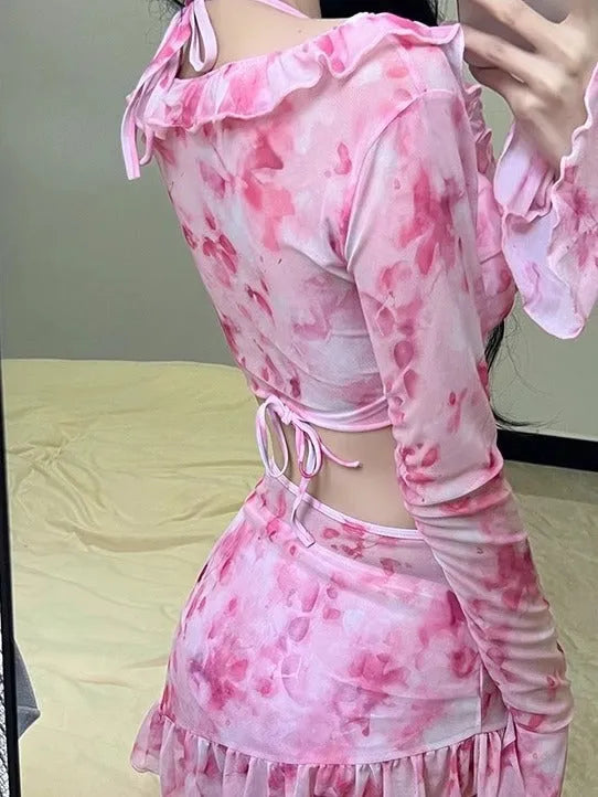 Women's floral bikini swimsuit in cherry blossom colours for beach and hot spring use