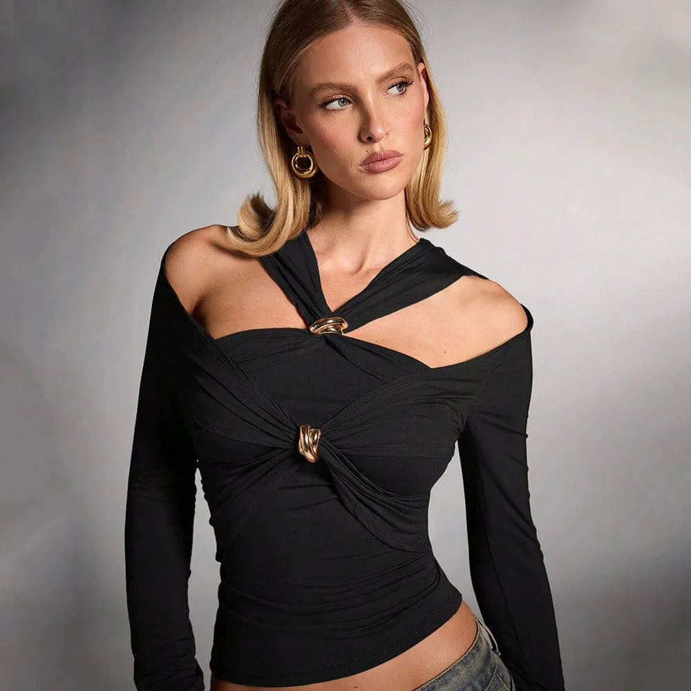 Black women's halter neck slim fit top with long sleeves on a mannequin.