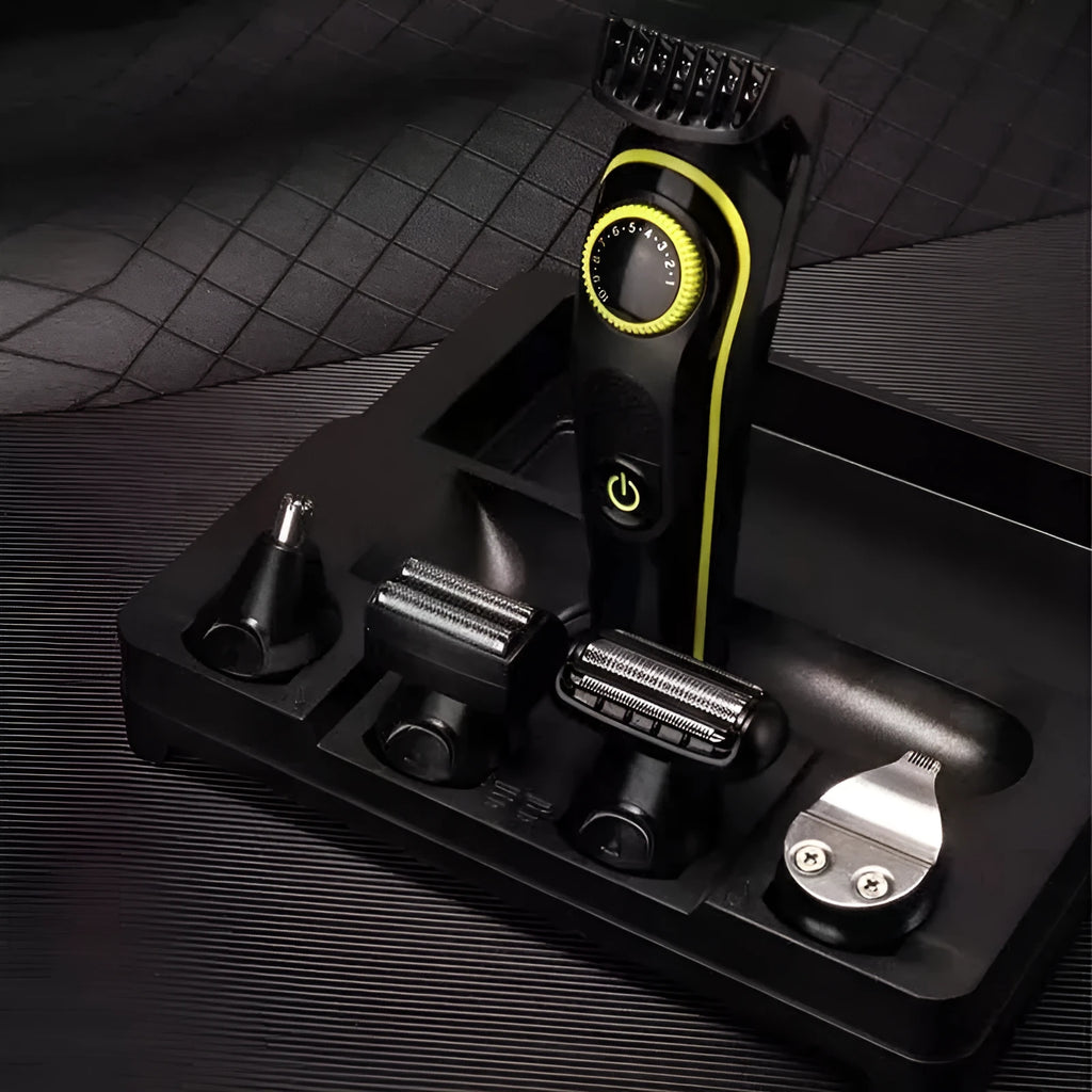 Black KM-696 rechargeable electric hair clipper set with stainless steel blades and USB charging cable