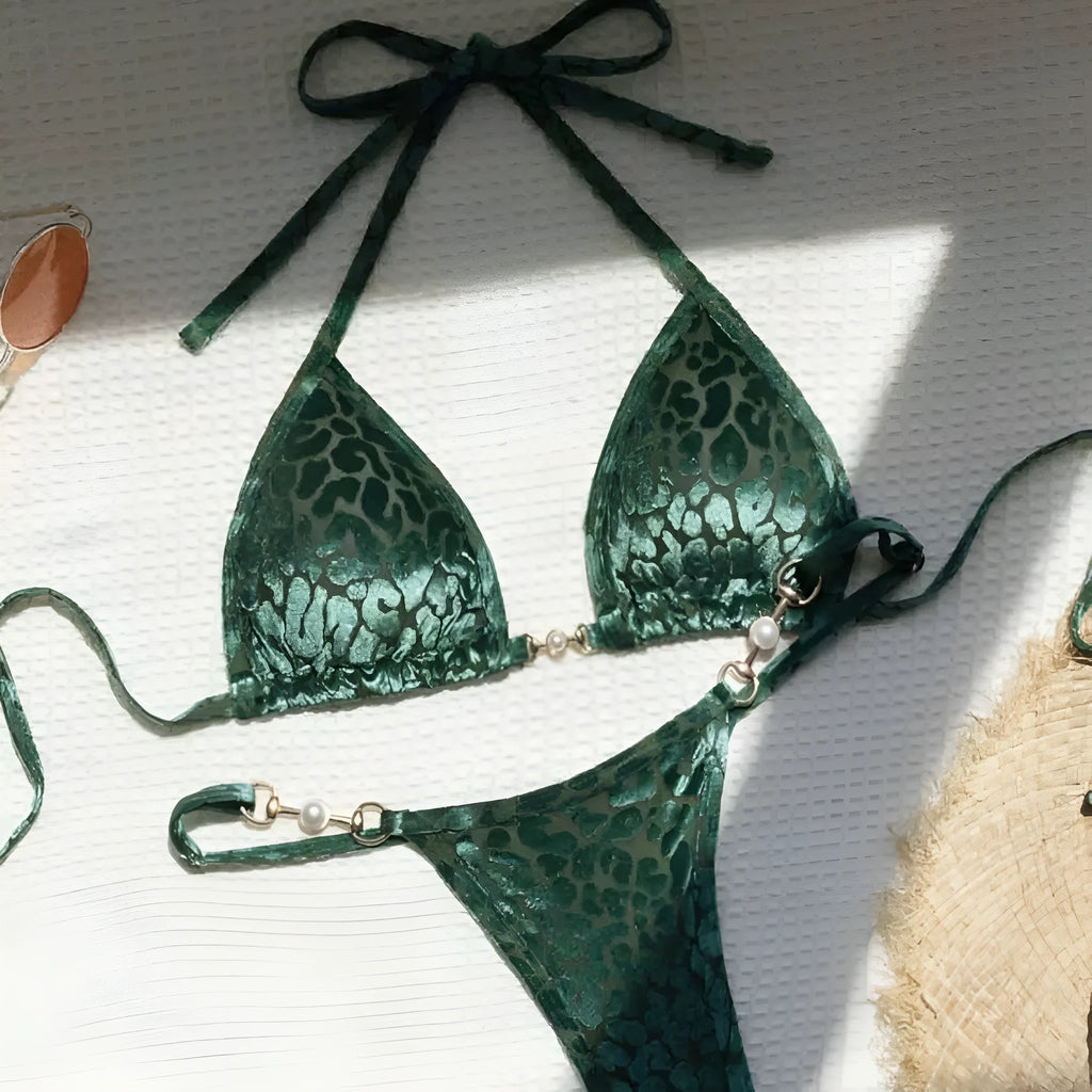 Women's blue leopard print T-shaped swimsuit bikini made from polyester and spandex fabric.