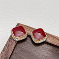 Red square alloy earrings with geometric inlaid design and sweet-cool hybrid style