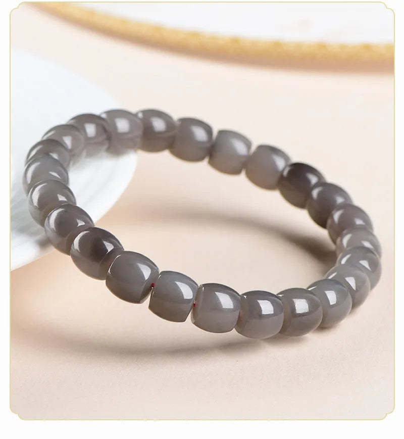 Straight cut Hetian jade bracelet in smokey violet colour with approximately 24 beads sized 8x9mm.