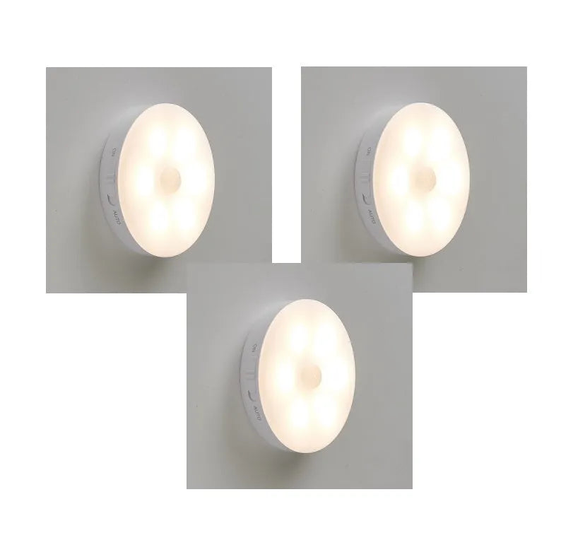 Wireless motion sensor LED night light with magnetic charging base for automatic illumination