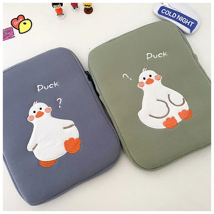 Cotton tablet case with cartoon duck embroidery design in blue or green colours with zipper closure