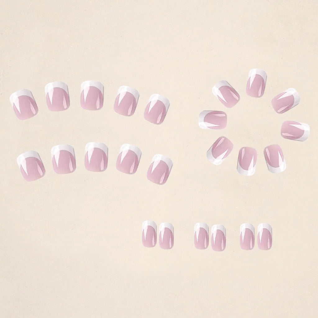 24 white plaid patterned press-on nail tips arranged in a box
