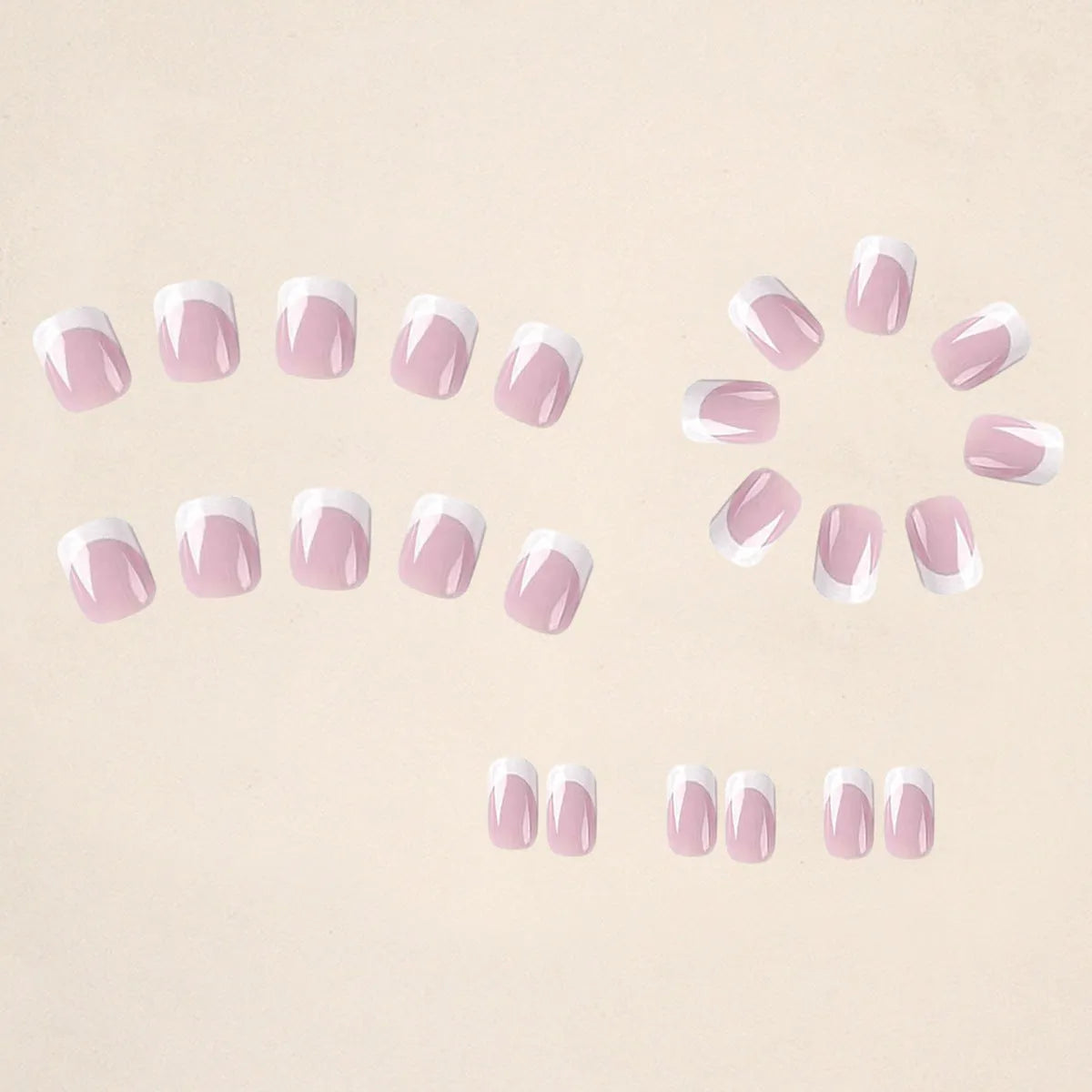 24 white plaid patterned press-on nail tips arranged in a box