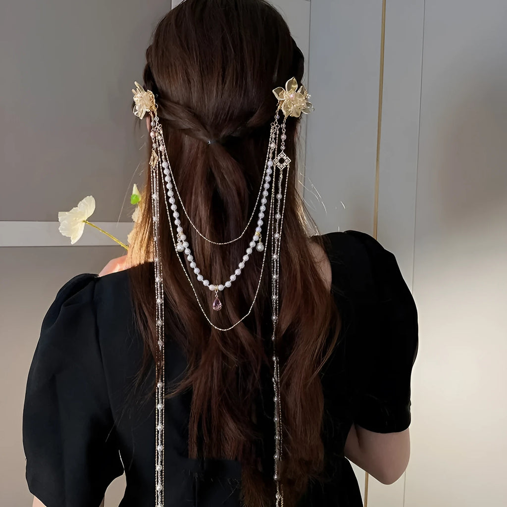 Women's hairpin with pearl, diamond and flower decorations featuring long tassel design and gold-colour grip