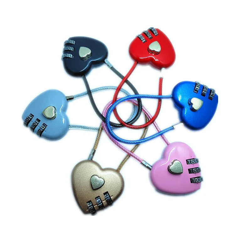 Peach heart-shaped cable lock with a long steel rope, shown in various colours including red, blue, and gold.
