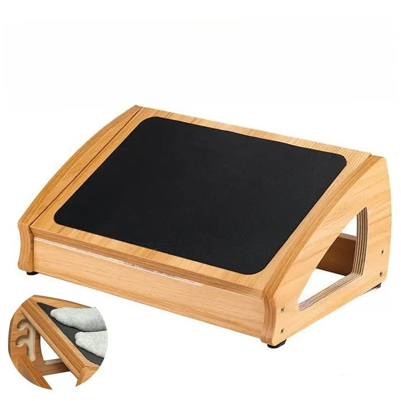 Wooden adjustable bamboo office desk footstool in natural wood colour, shown as an under-desk ergonomic foot rest.