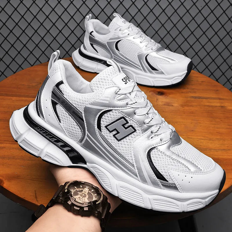 Men's black and white mesh casual running shoes with a round toe and plastic sole.