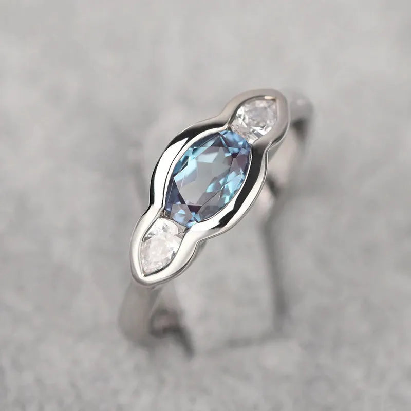Women's geometric ellipse ring with white gold colour finish and inlaid zircon stones