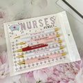 Five nurse-themed ballpoint pens with humorous medical copywriting in plastic retractable design