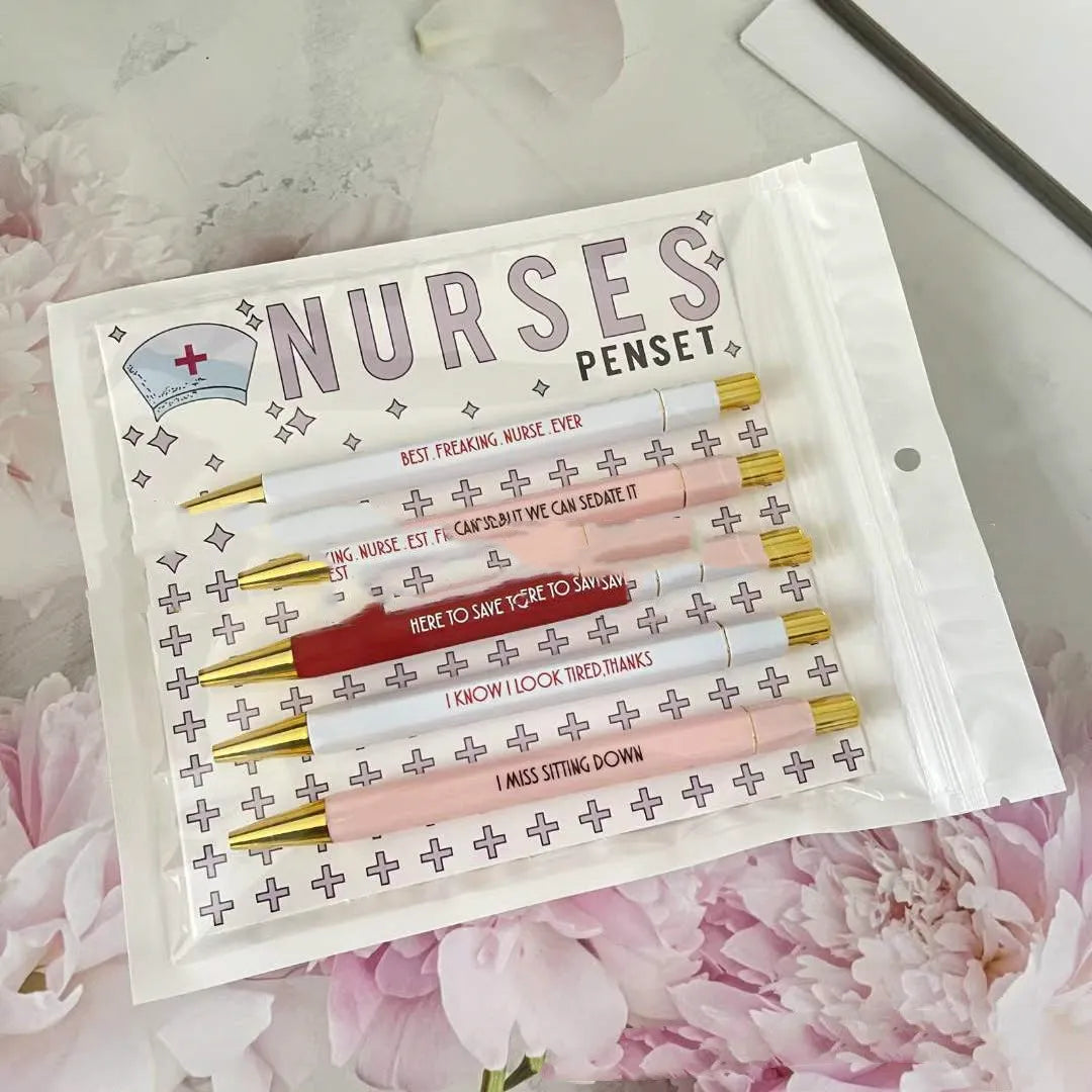 Five nurse-themed ballpoint pens with humorous medical copywriting in plastic retractable design