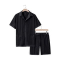 Lightweight women's beach shorts suit set in lake blue, showing short sleeve jacket and matching shorts.