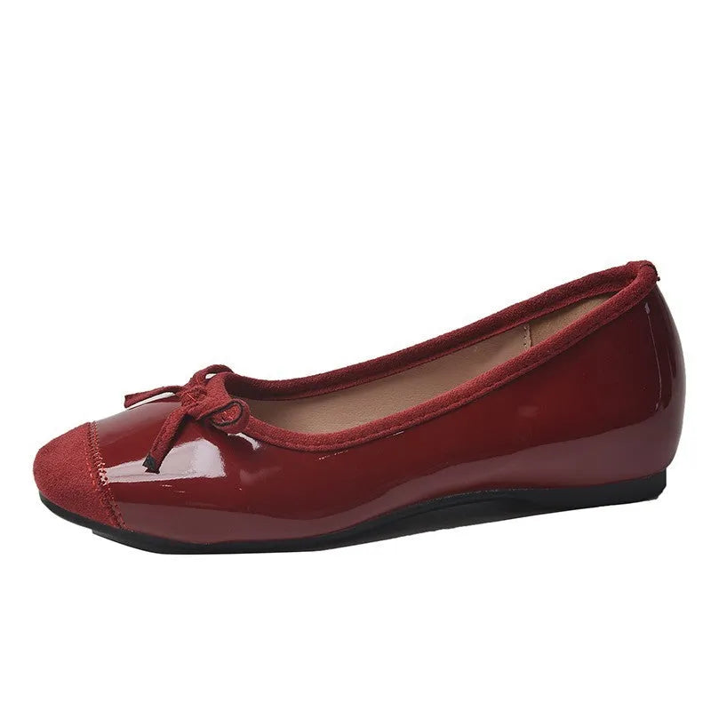 Women's retro apricot Mary Jane ballet flats with square toe and bow decoration on a rubber sole.
