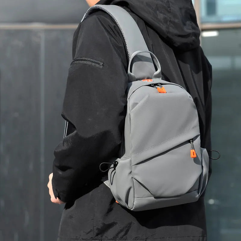 Men's black polyester crossbody bag with waterproof coating and shoulder strap