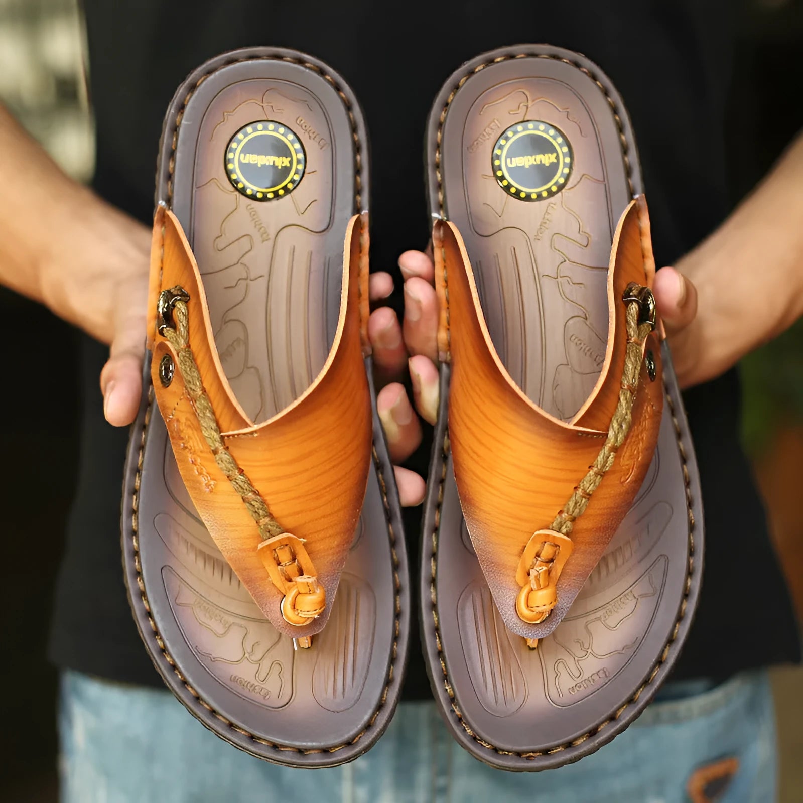 Men's dark blue herringbone pattern outdoor slippers with leather lining and a rubber sole.