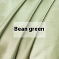 Solid colour silk duvet cover laid flat, showing double-sided construction and smooth texture.