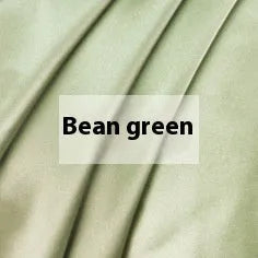 Solid colour silk duvet cover laid flat, showing double-sided construction and smooth texture.