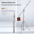 Silver stainless steel ceiling-mounted cross arm lamp rack showing extended and collapsed positions