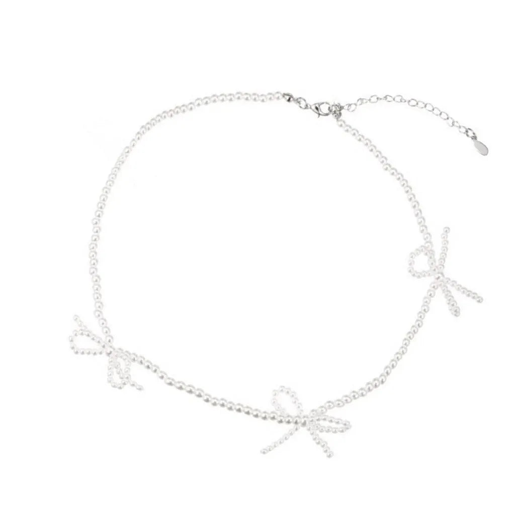 White bow pearl necklace for women with adjustable 31-40cm length and geometric design