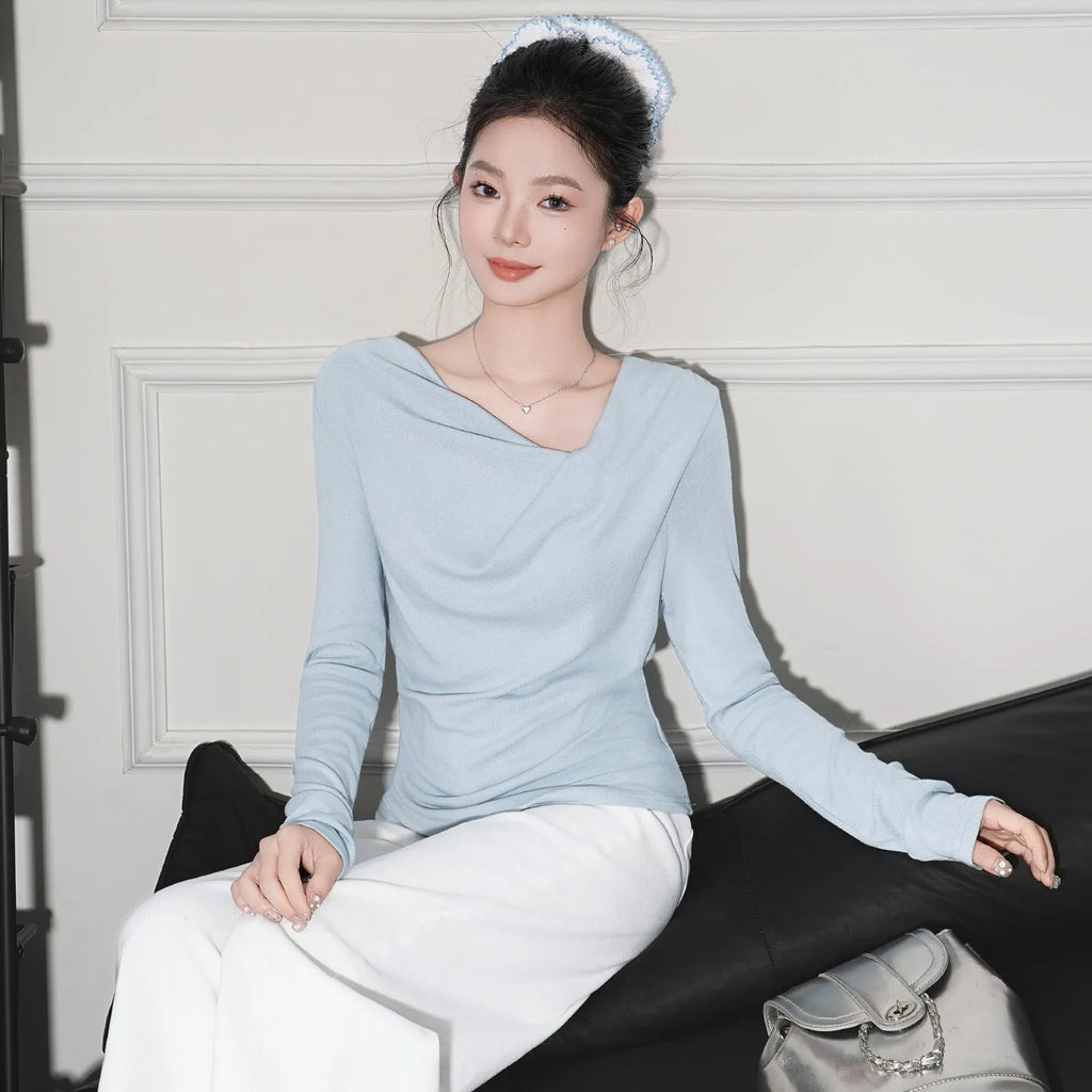 Off-shoulder cashmere long-sleeve top in light pink with pleated detail and slim fit