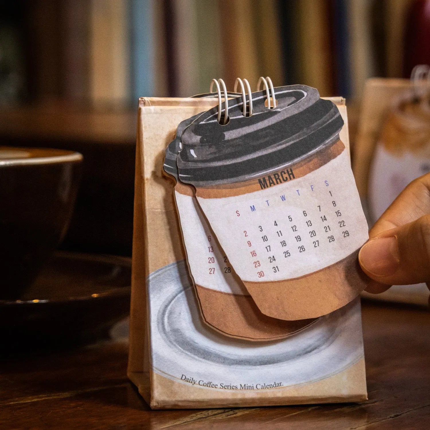 Mini desk calendar 2025 with coffee themed designs including four model options