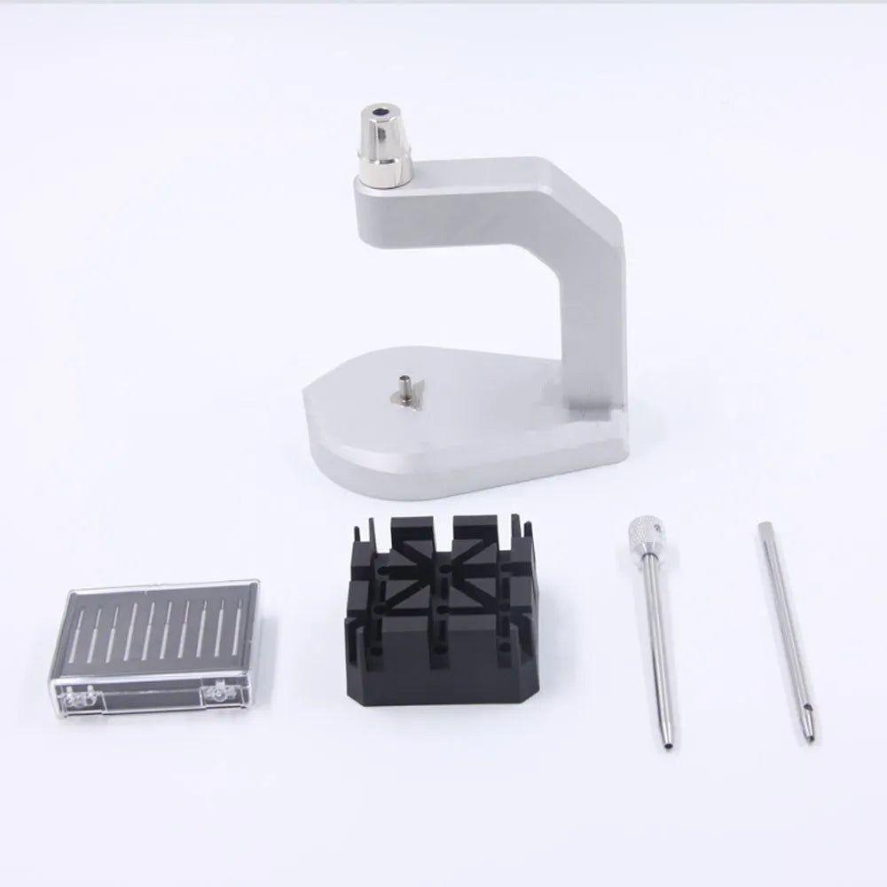 Silver tool steel multi-purpose press strap removal tool with 0.50-1.60mm blade on a workshop surface.