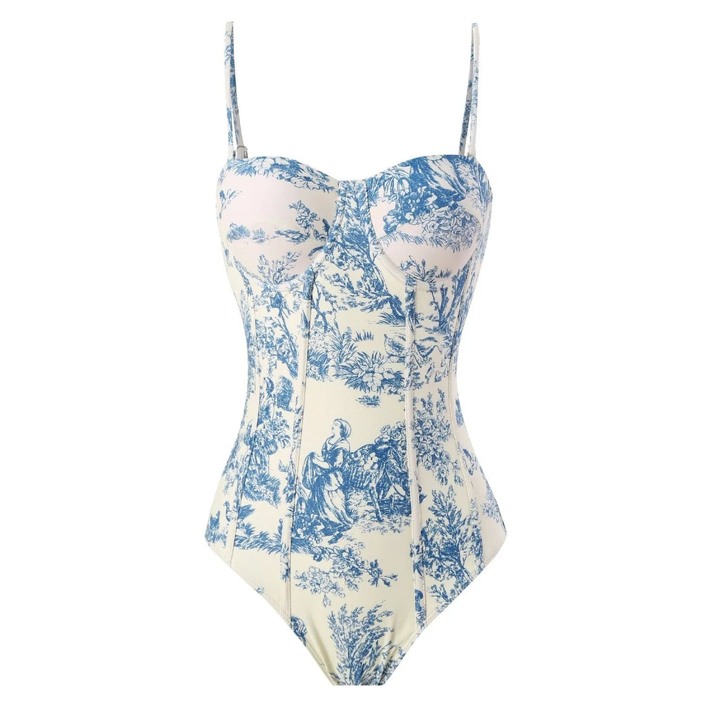 Blue patterned one-piece swimsuit for women with optional gauze skirt, shown on a model.