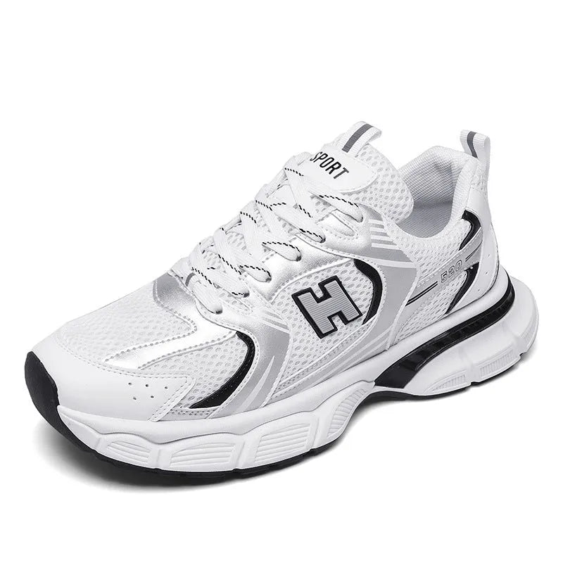 Men's black and white mesh casual running shoes with a round toe and plastic sole.