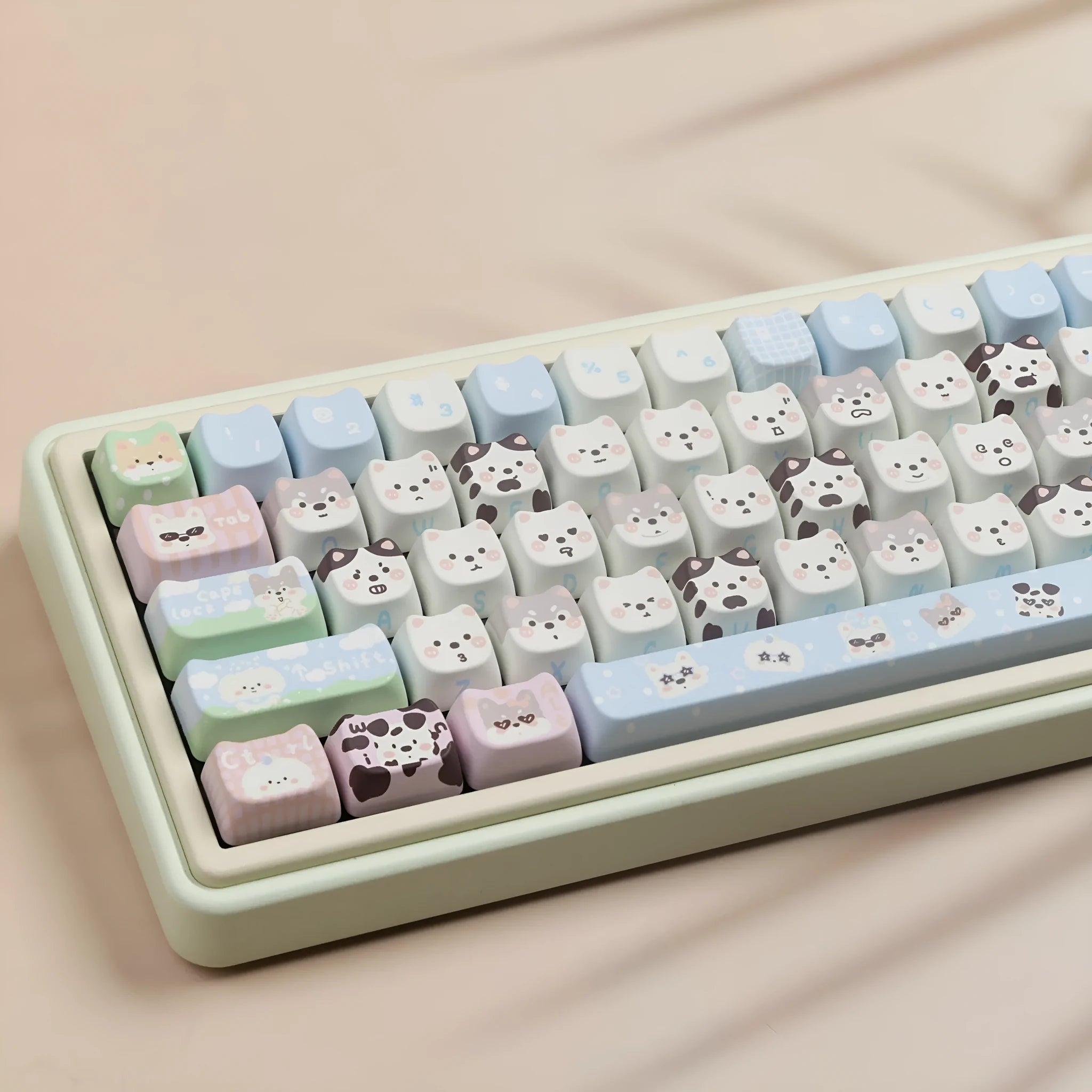 PBT sublimation key cap set showing colourful puppy and cat artwork on mechanical keyboard keys