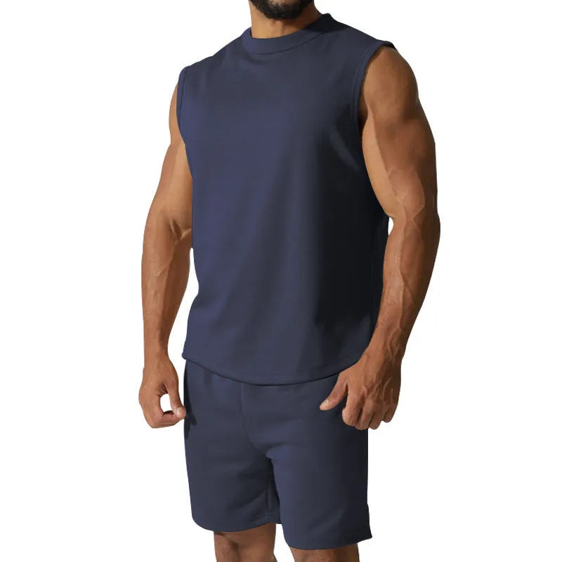 Men's sleeveless sports suit set showing sleeveless top and matching shorts in cotton blend fabric