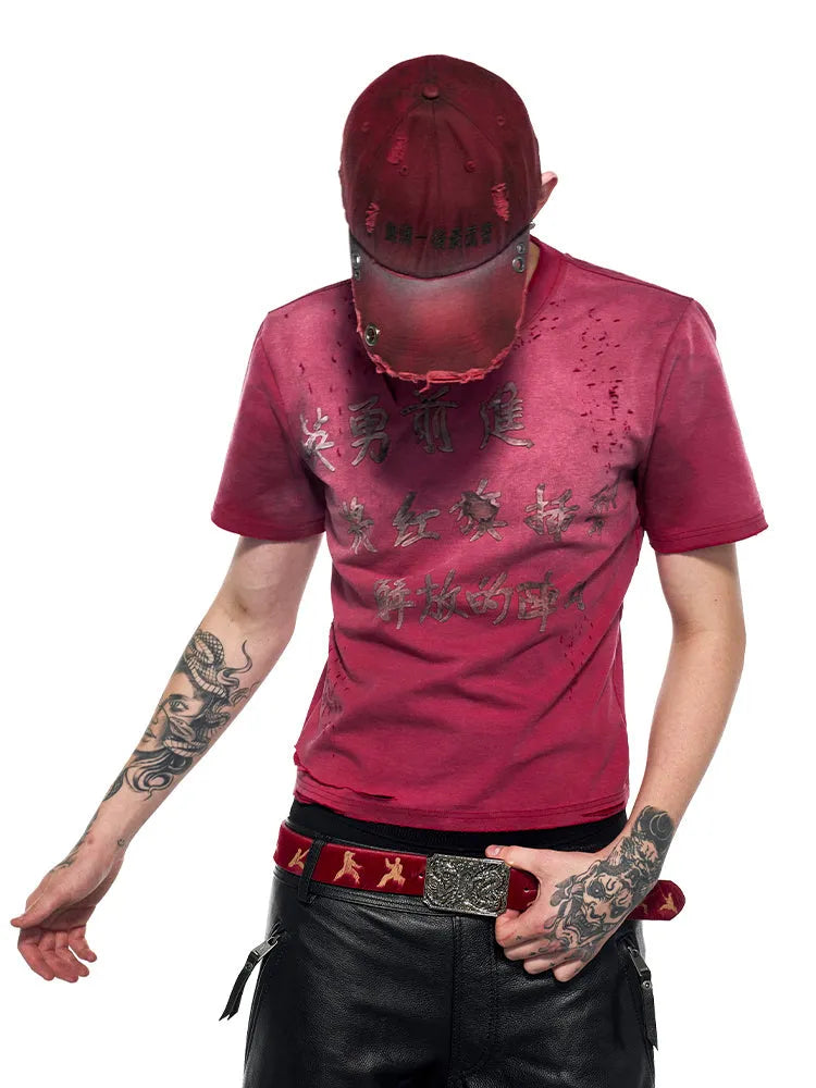 Red men's slim-fit t-shirt with a distressed spray wash effect on the fabric.