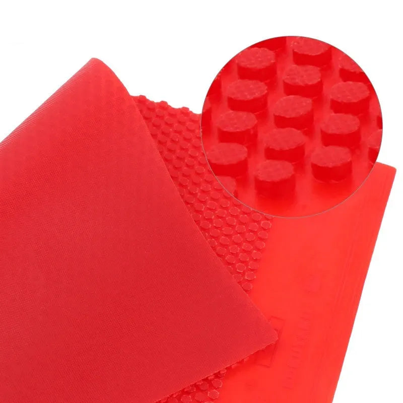 Table tennis rubber sheet with small particle texture in black or red colour options