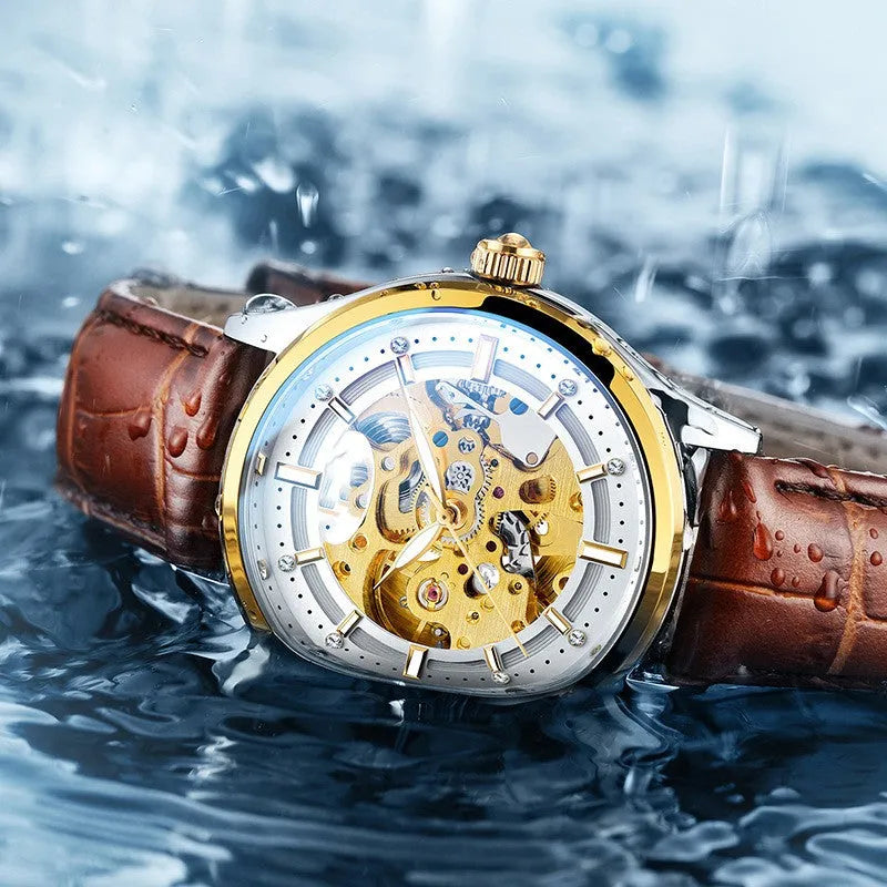 Gold shell mechanical watch with brown leather strap and white dial on a wrist