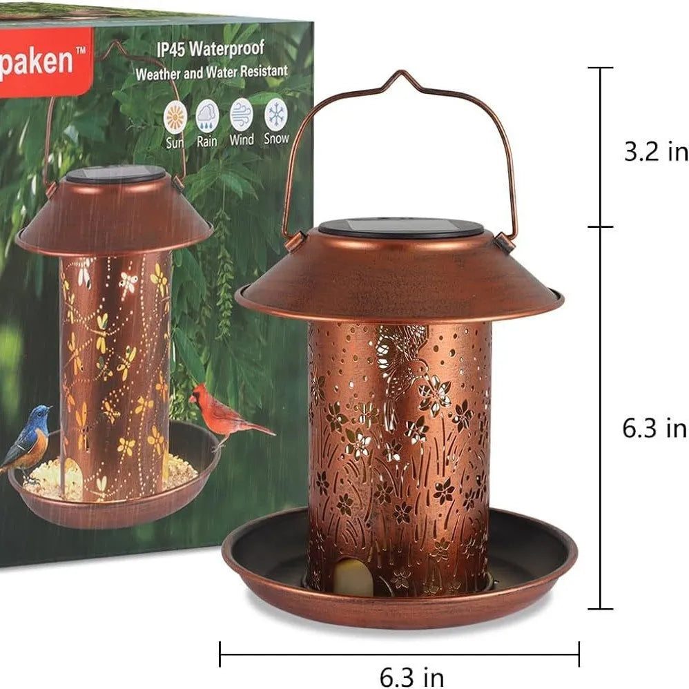 Solar-powered hummingbird pattern bird feeder with integrated garden lighting in iron art construction