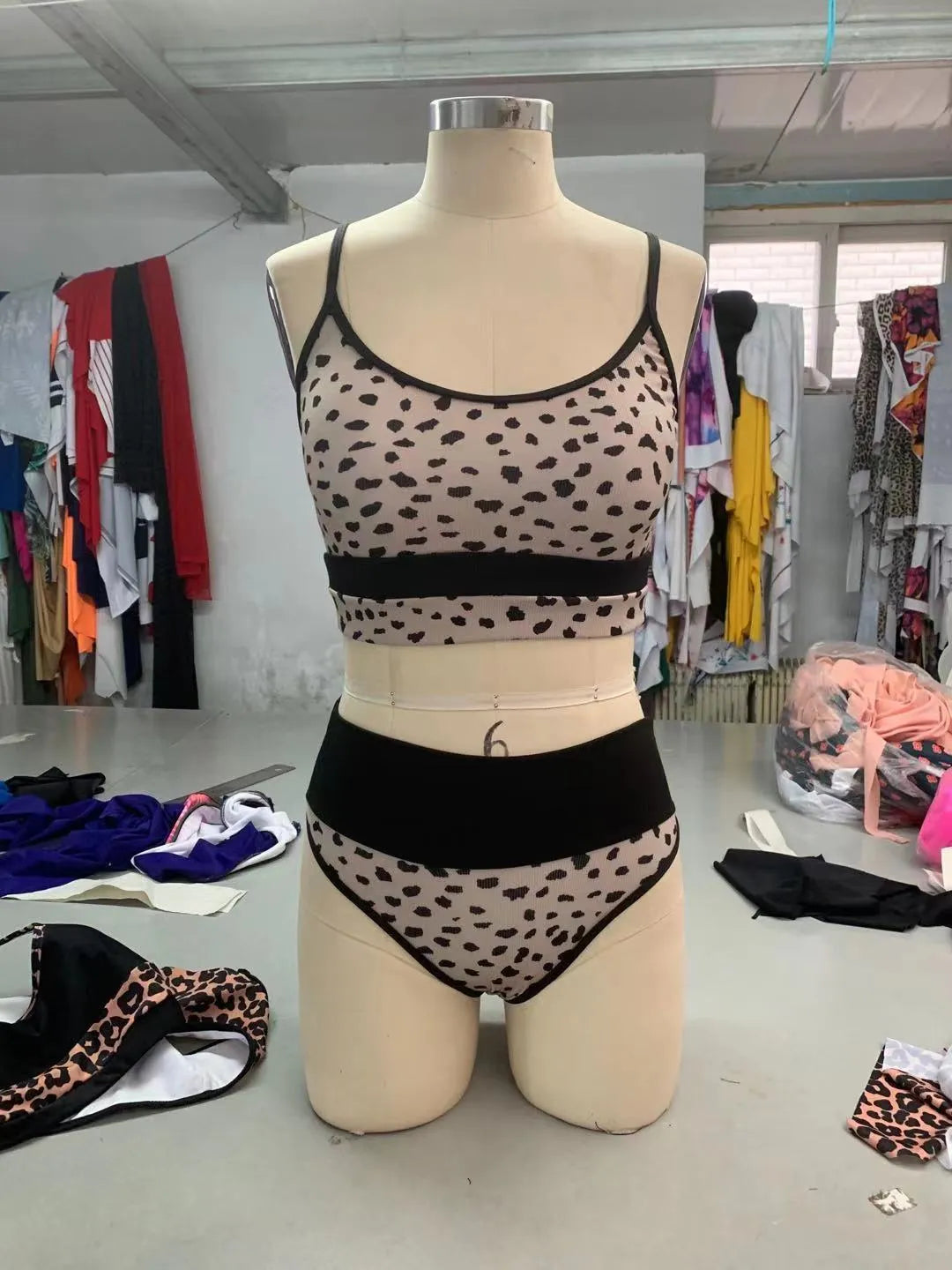 Women's high-waist split bikini swimsuit in leopard print or white colour options