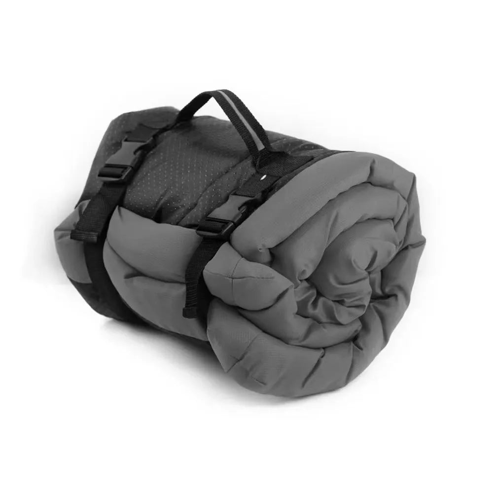 Blue foldable waterproof dog bed shown both open and secured with buckles for portable carry