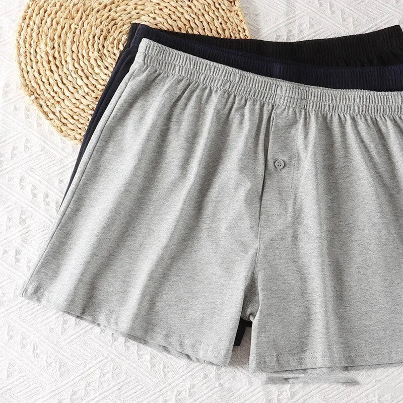 Men's pure cotton high-waist boxer shorts in light grey, navy blue, and black colours.