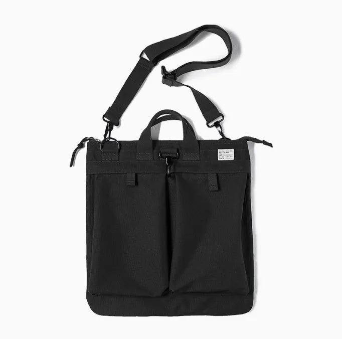 Retro style canvas crossbody messenger bag in charcoal black with zipper closure and shoulder strap