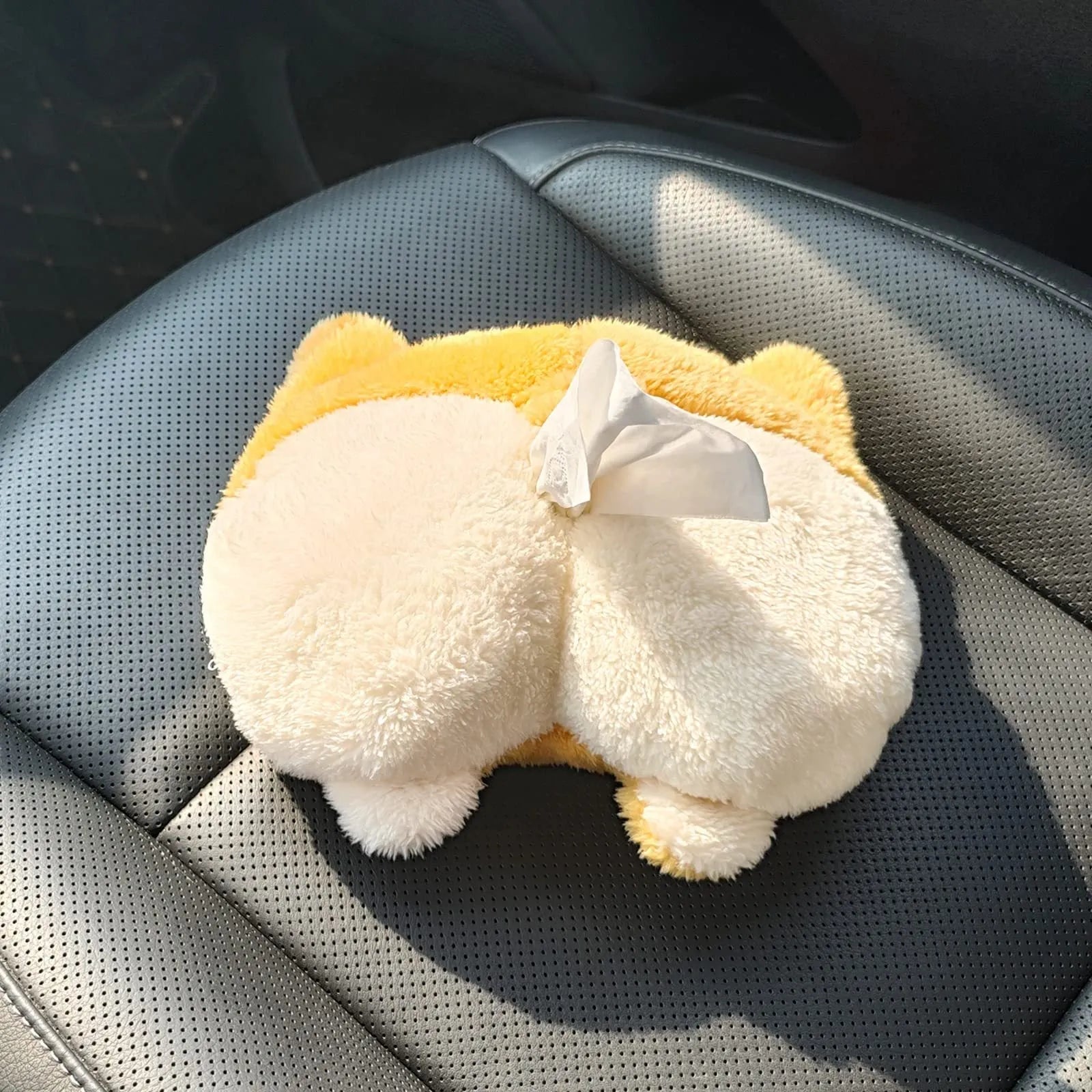 Yellow corgi butt-shaped tissue box cover with elastic back for car sun visor mounting