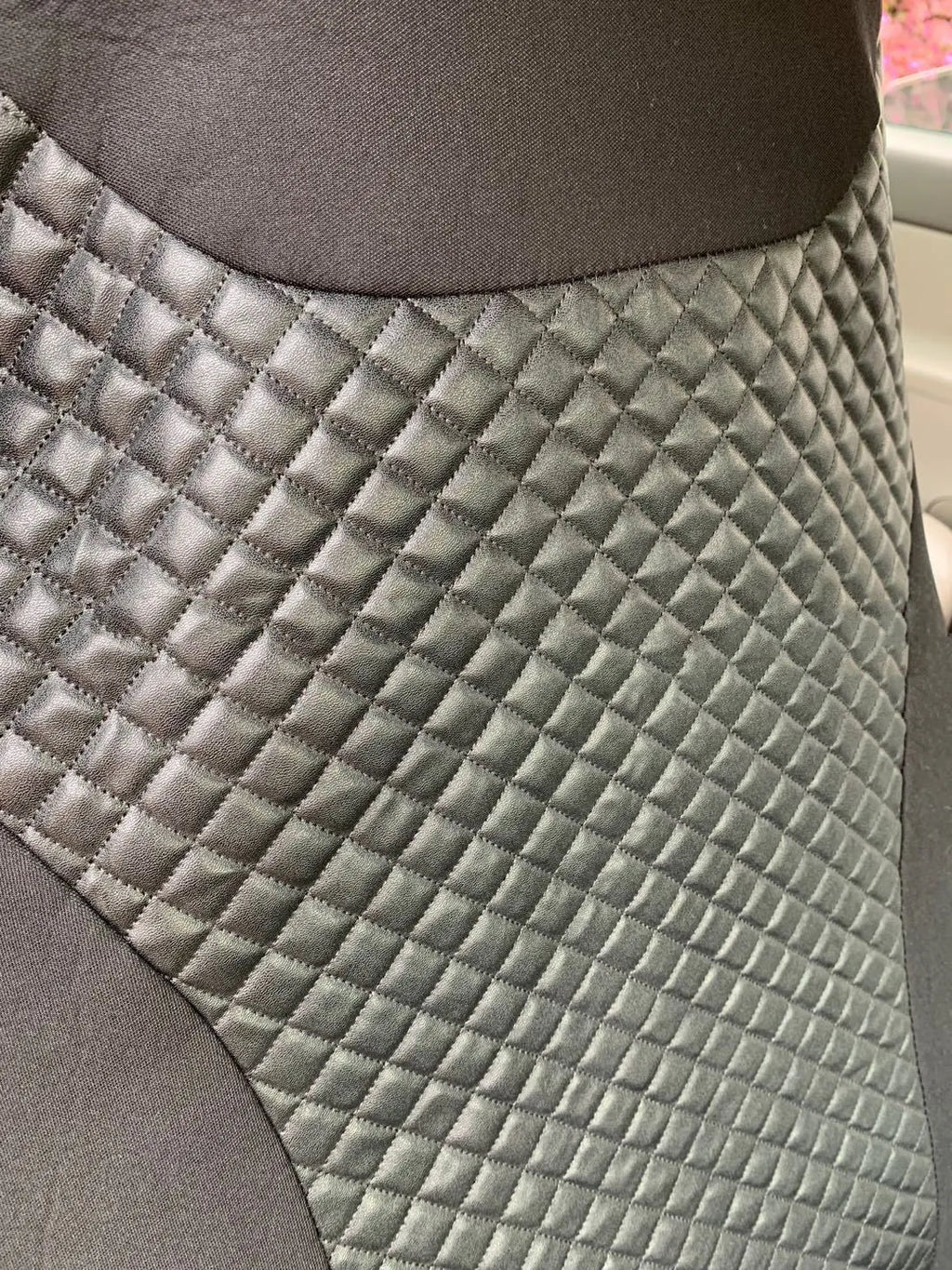 Black quilted automotive seat cover with PU and polyester construction for car seat protection