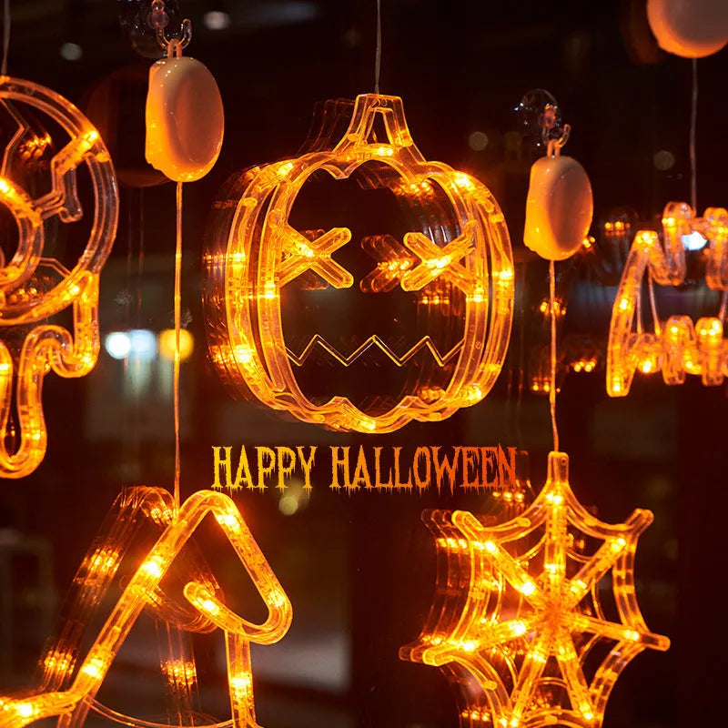 Halloween window hanging LED lights set with seven designs including spiders, pumpkins, and ghosts
