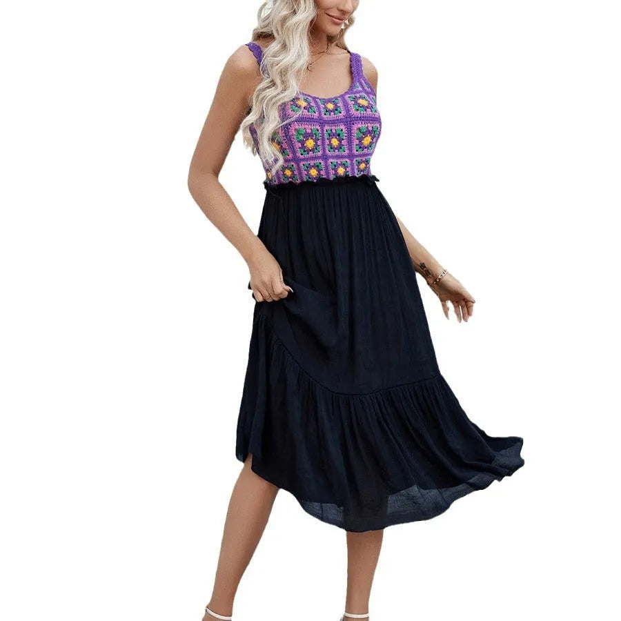 Purple sleeveless midi dress with white hand-hooked crochet floral pattern across the skirt.