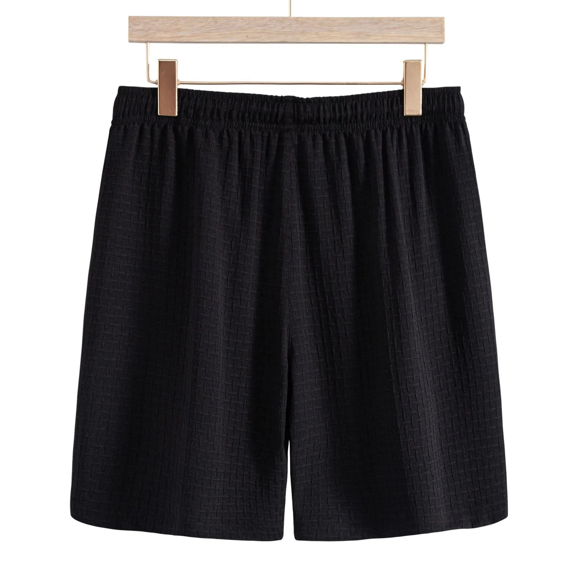 Men's loose-fit cotton blend shirt and shorts co-ord set in solid black colour.
