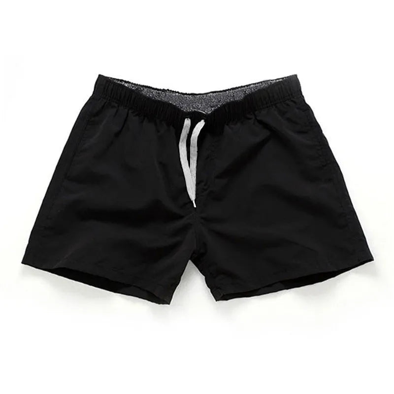 Men's plus-size polyester beach shorts in multiple colours on a size chart background.
