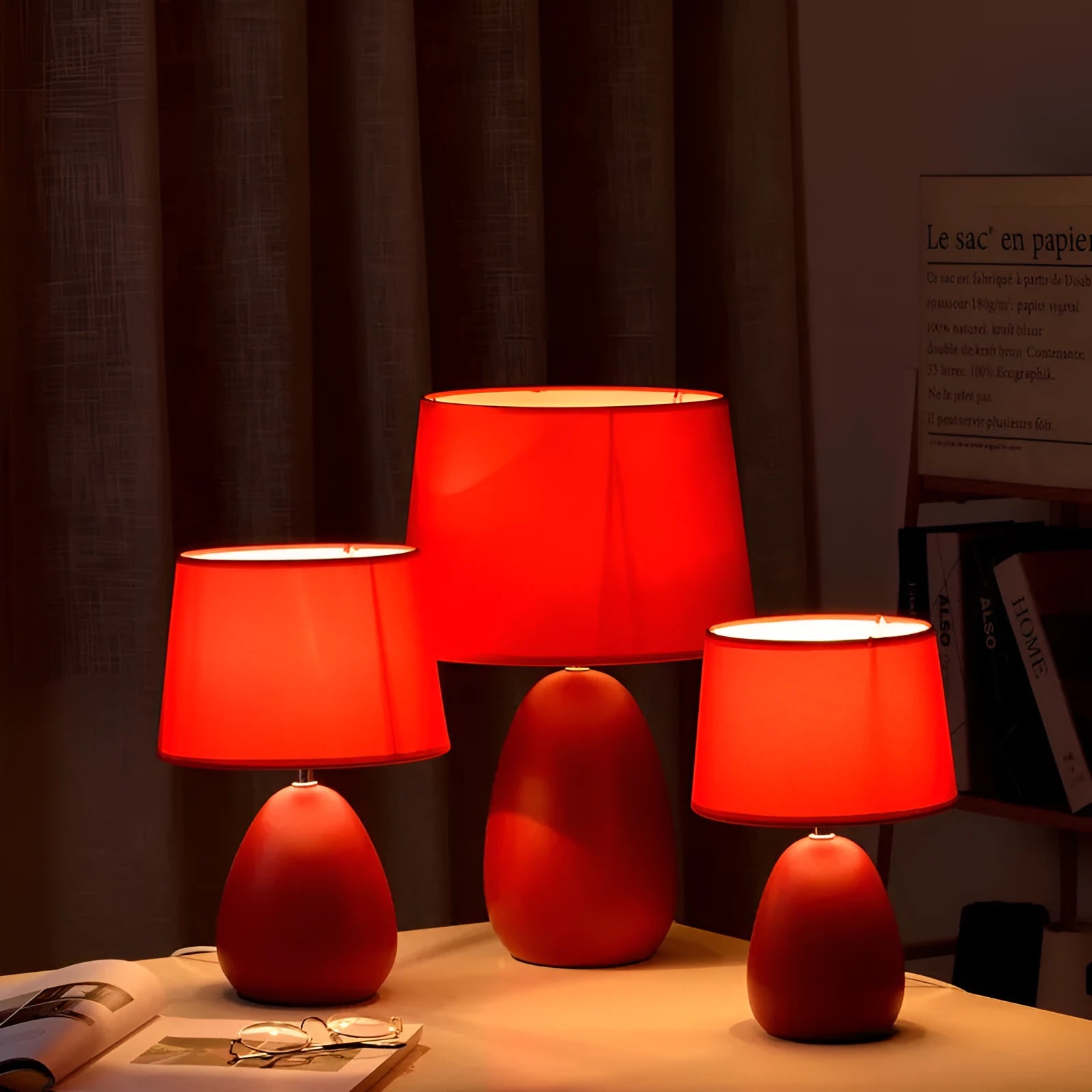 Small Nordic minimalist ceramic desk lamp in pink with LED light on desk
