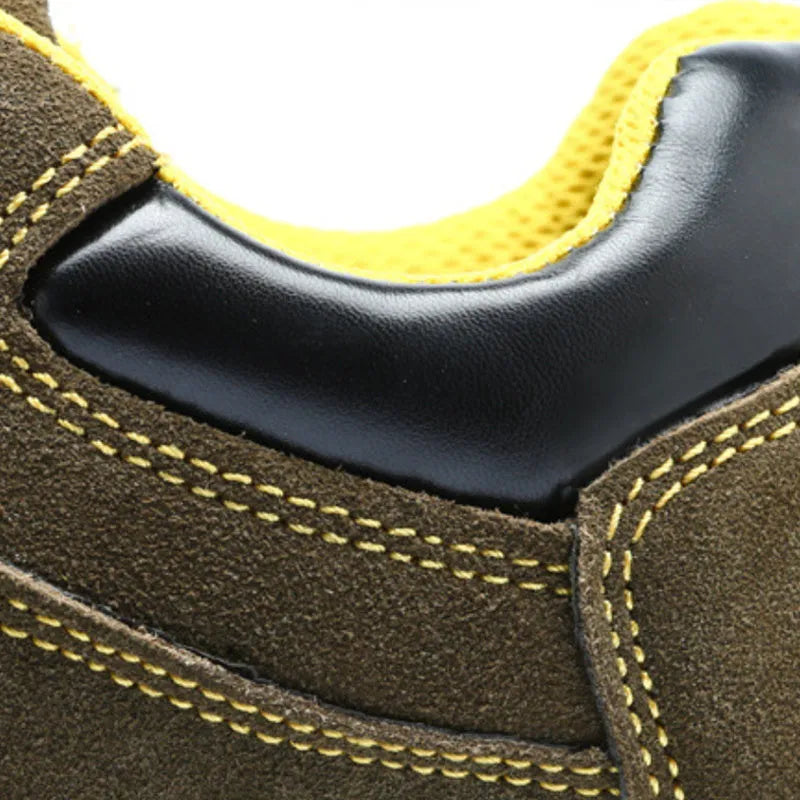 Bronze-coloured leather safety shoes with a steel toe cap and textured anti-slip sole.