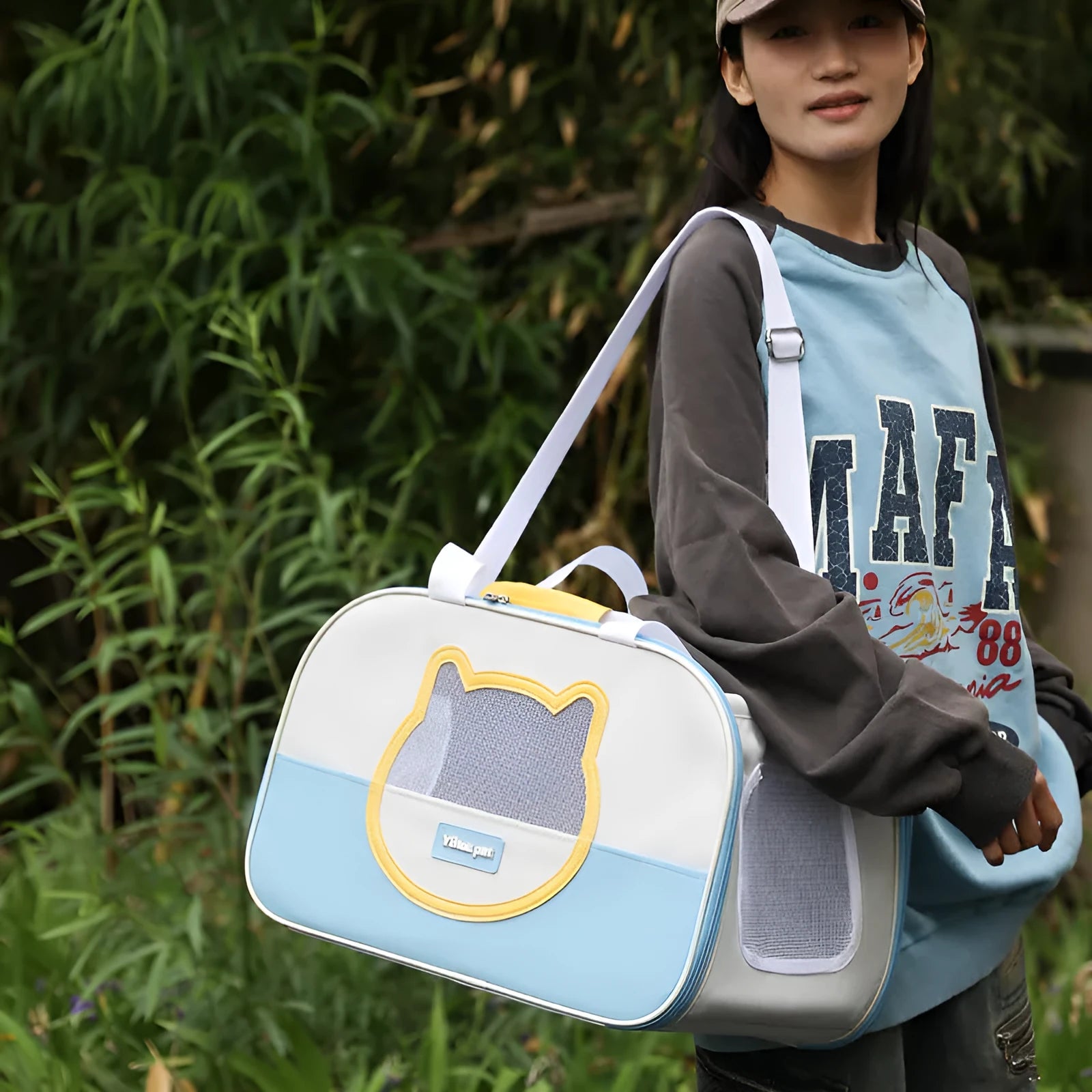 Blue foldable Oxford cloth cat backpack for outdoor use with mesh ventilation panels.