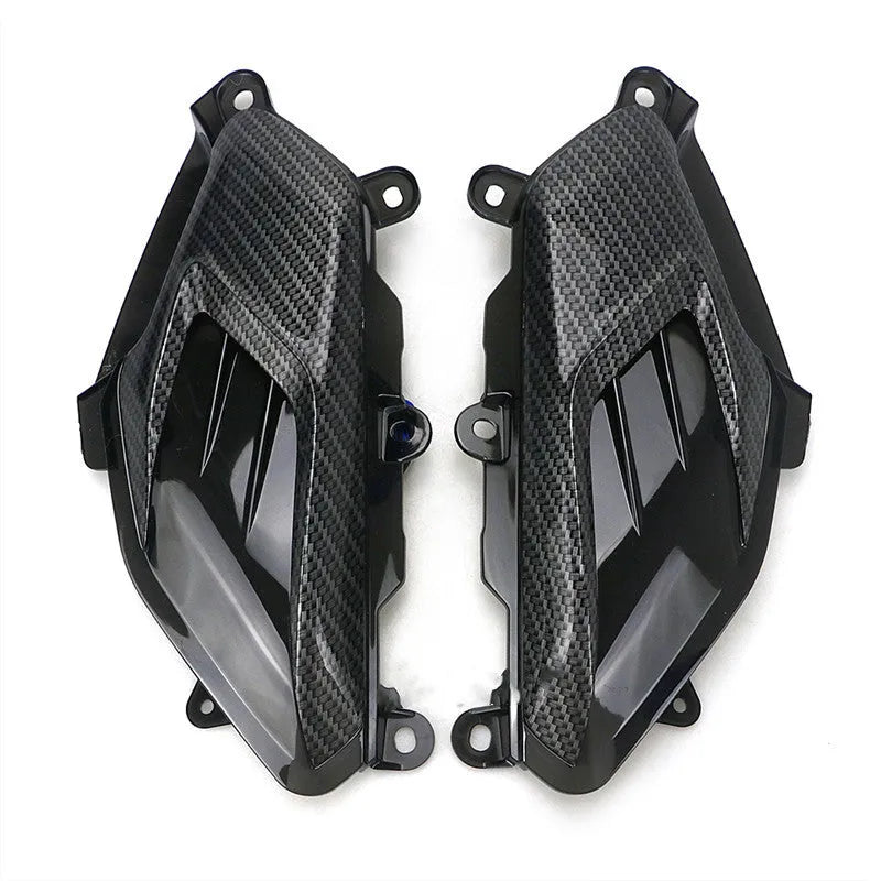 Pair of YAMAHA NMAX LED side lamps with carbon fibre decoration and choice of blue or red light.